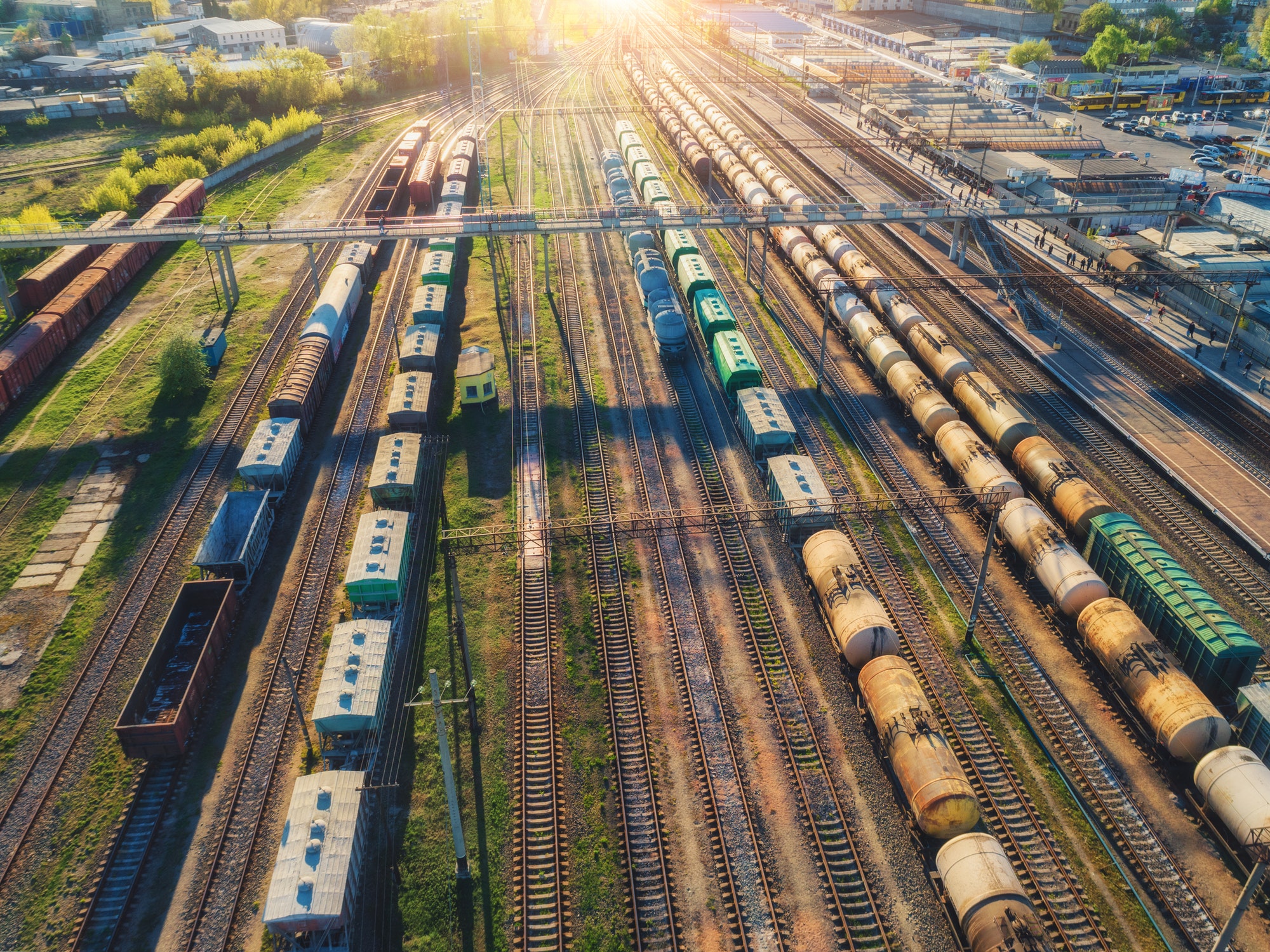 Aerial view of colorful freight trains on railroad